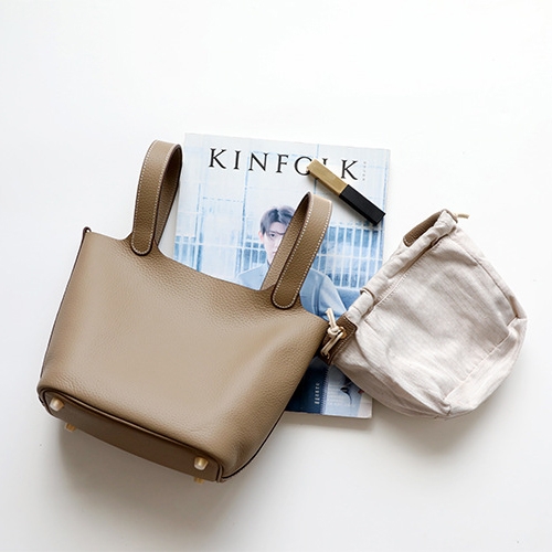 Weiße Tasche aus echtem Leder mit Litschi-Korn-Schnalle, Tragegriff oben und Innentasche